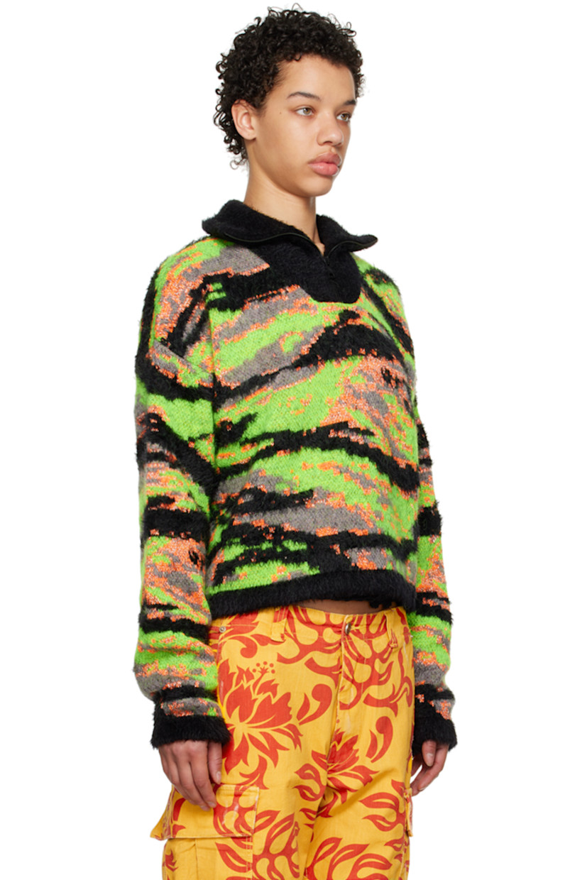 Brushed knit recycled polyester- and mohair-blend turtleneck. Metallic thread detailing and jacquard graphic pattern throughout.

· Half-zip closure
· Rib knit hem and cuffs

Supplier color: Green rave camo
