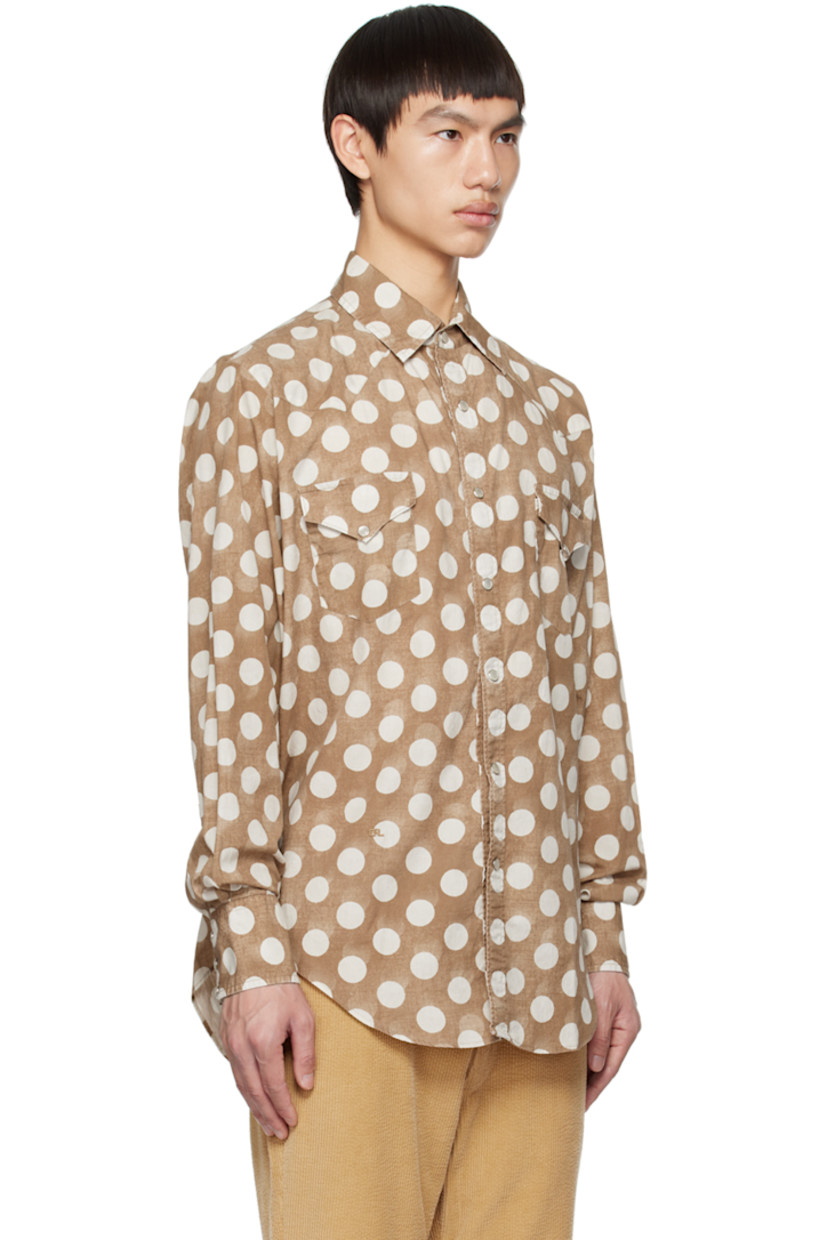 Cotton poplin shirt. Polka dot pattern printed throughout. 

· Spread collar
· Press-stud closure
· Flap pockets 
· Shirttail hem
· Three-button barrel cuffs

Supplier color: Brown/Polka dot