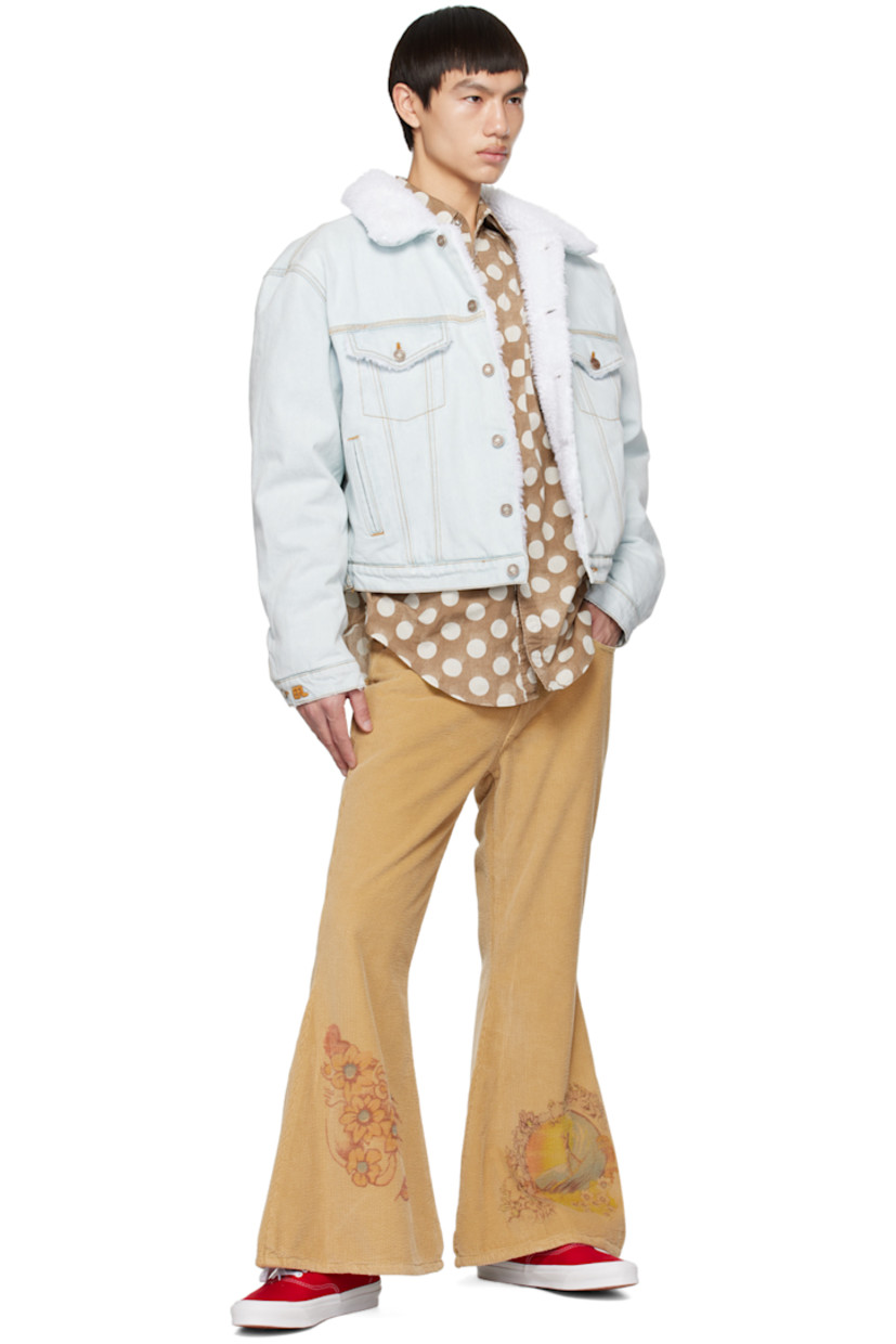 Cotton poplin shirt. Polka dot pattern printed throughout. 

· Spread collar
· Press-stud closure
· Flap pockets 
· Shirttail hem
· Three-button barrel cuffs

Supplier color: Brown/Polka dot