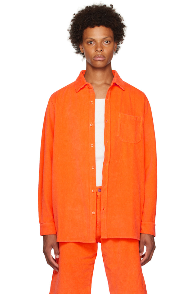 Stretch cotton corduroy shirt. 

· Spread collar 
· Button closure 
· Patch pocket 
· Logo embroidered at front 
· Vented hem 
· Single-button barrel cuffs 
· Twin pleats at back 

Supplier color: Orange