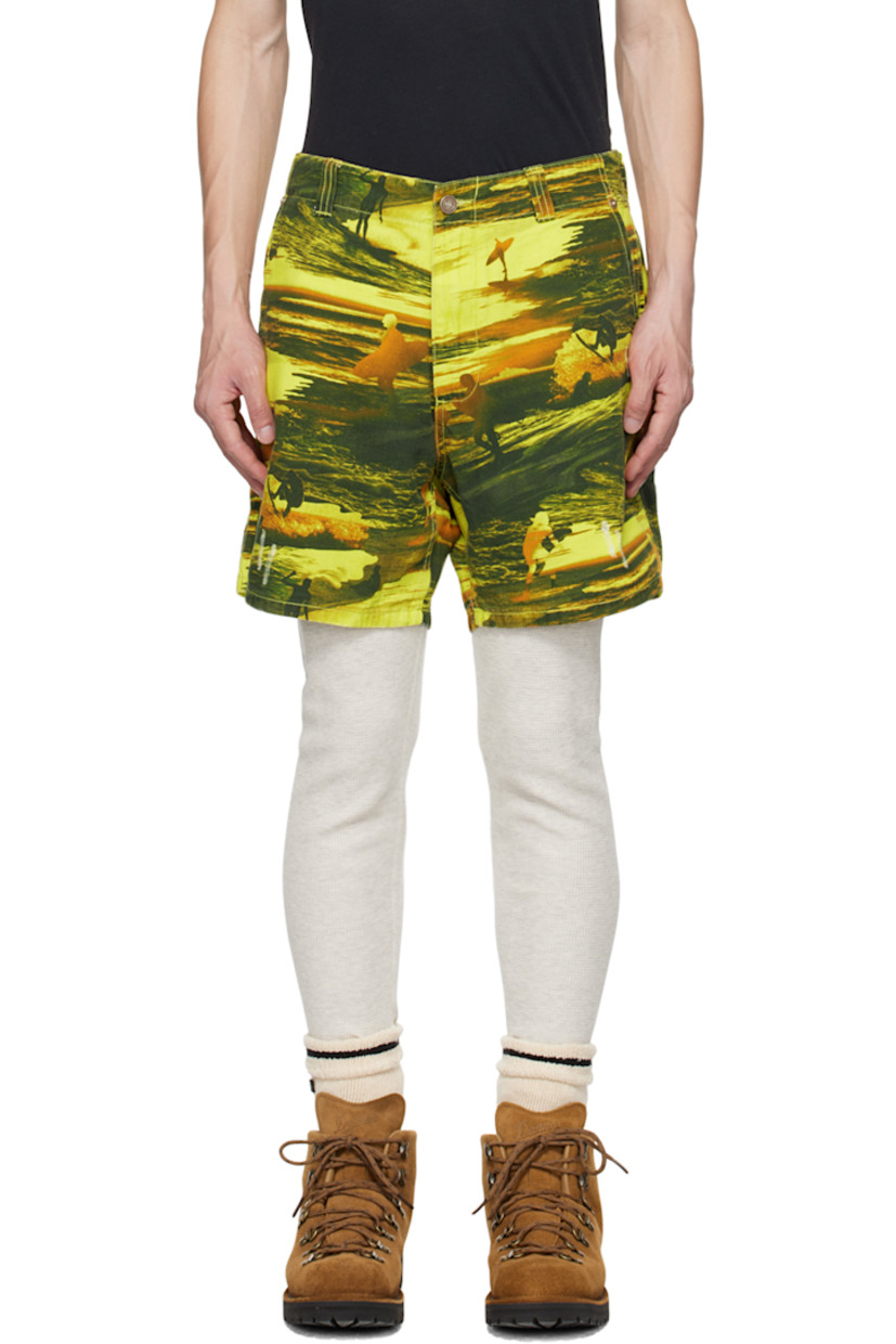 Cotton canvas shorts. Distressing and printed graphics throughout.

· Pre-washed
· Belt loops
· Four-pocket styling
· Zip-fly
· Cinch tabs at back waistband
· Logo embroidered at back
· Logo-engraved antiqued silver-tone hardware

Supplier color: Acid sunset