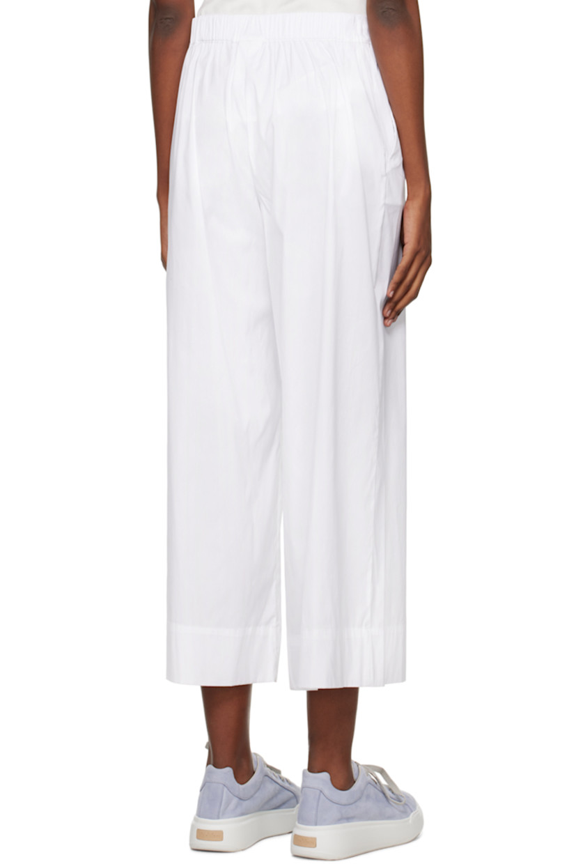 Semi-sheer stretch cotton- and nylon-blend poplin lounge pants.

· Elasticized waistband
· Two-pocket styling

Supplier color: Optical white