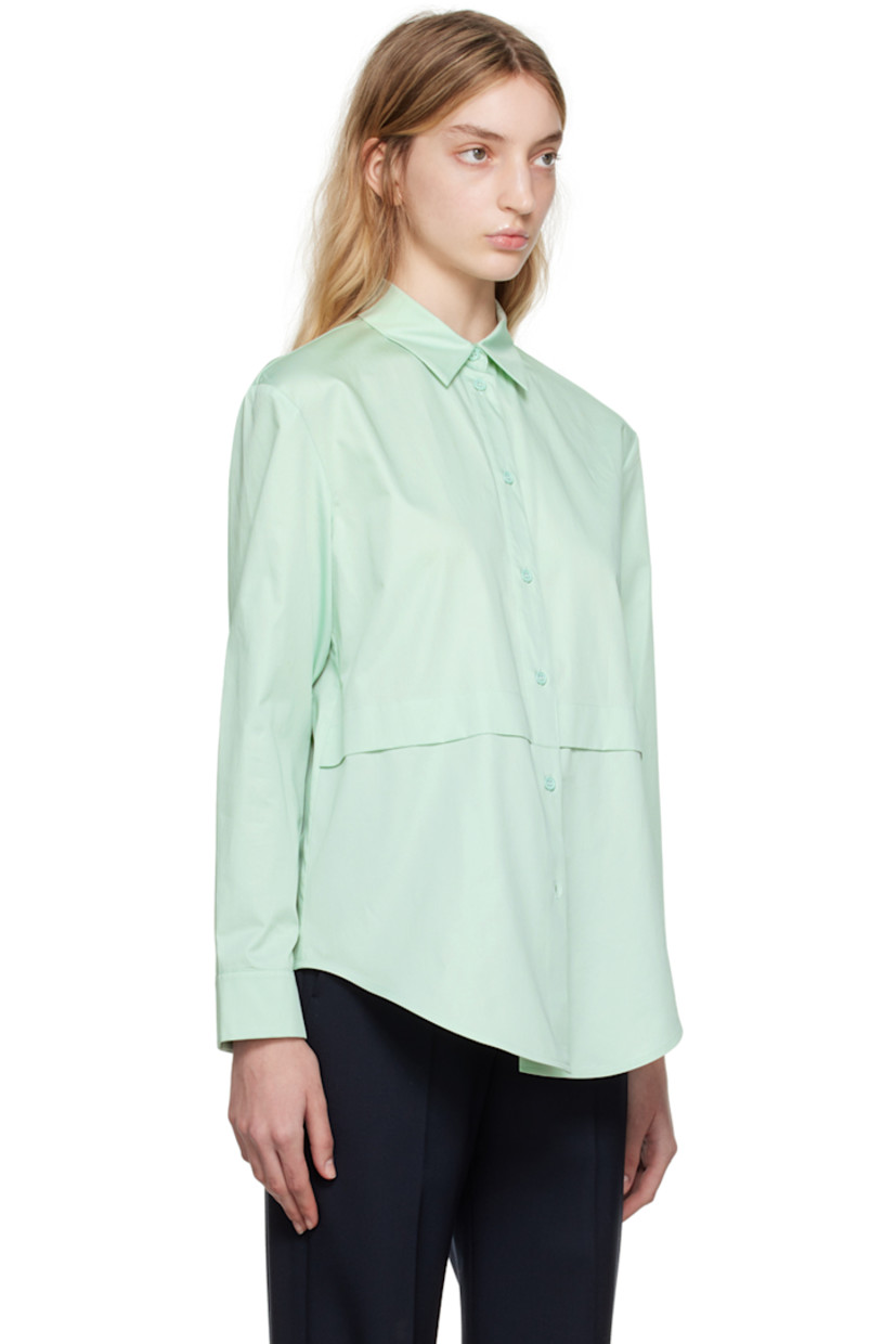 Cotton poplin shirt.

· Paneled construction
· Spread collar
· Button closure
· Shirttail hem
· Single-button barrel cuffs

Supplier color: Sage green