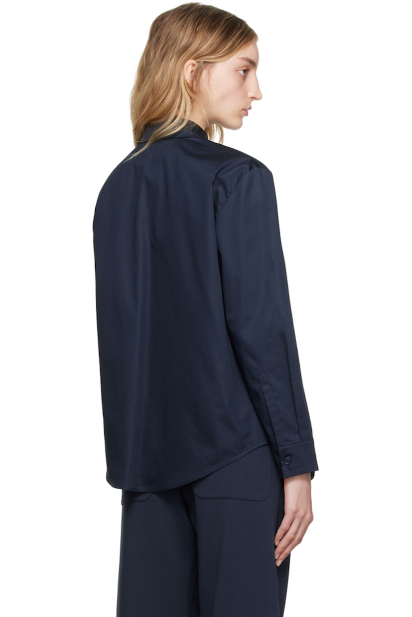 Cotton poplin shirt.

· Paneled construction
· Spread collar
· Button closure
· Shirttail hem
· Single-button barrel cuffs

Supplier color: Midnight blue