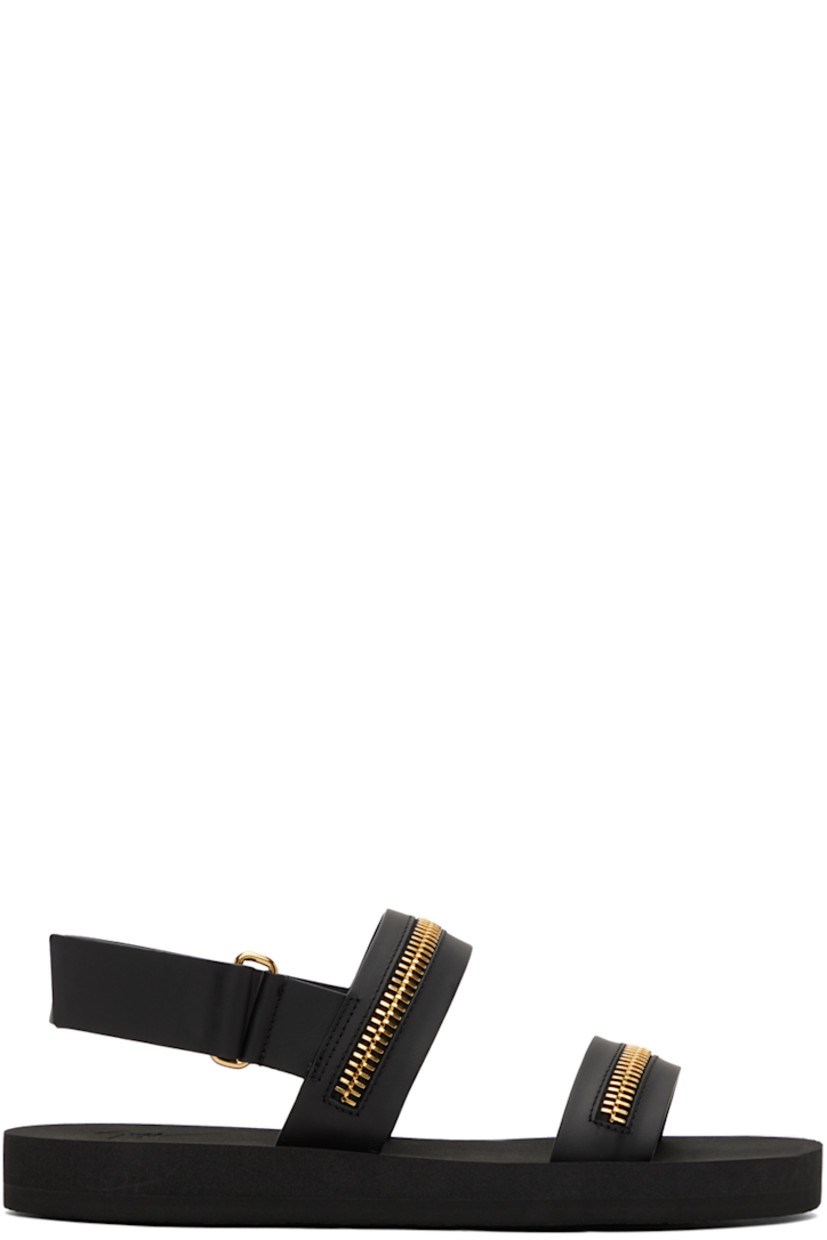 Buffed leather sandals in black.

· Open round toe 
· Straps with zip detailing at vamp 
· Velcro slingback strap
· Foam rubber sole

Supplier color: Black/Gold