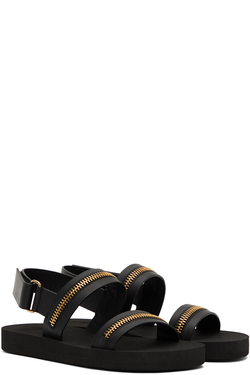 Buffed leather sandals in black.

· Open round toe 
· Straps with zip detailing at vamp 
· Velcro slingback strap
· Foam rubber sole

Supplier color: Black/Gold