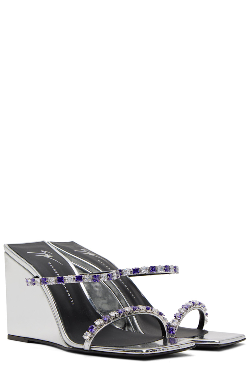 Patent leather slip-on heeled sandals in silver-tone.

· Open square toe
· Straps with crystal-cut accents at vamp
· Logo embossed at cushioned footbed
· Covered block heel with rubber injection
· Leather sole
· Heel: H3.3 in

Supplier color: Silver
