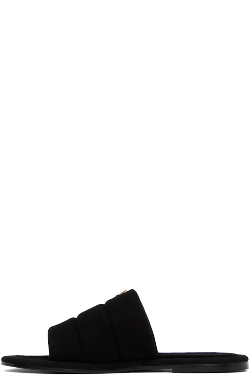 Quilted suede slip-on sandals in black.

· Open round toe 
· Gold-tone logo hardware at vamp 
· Leather sole 

Supplier color: Nero