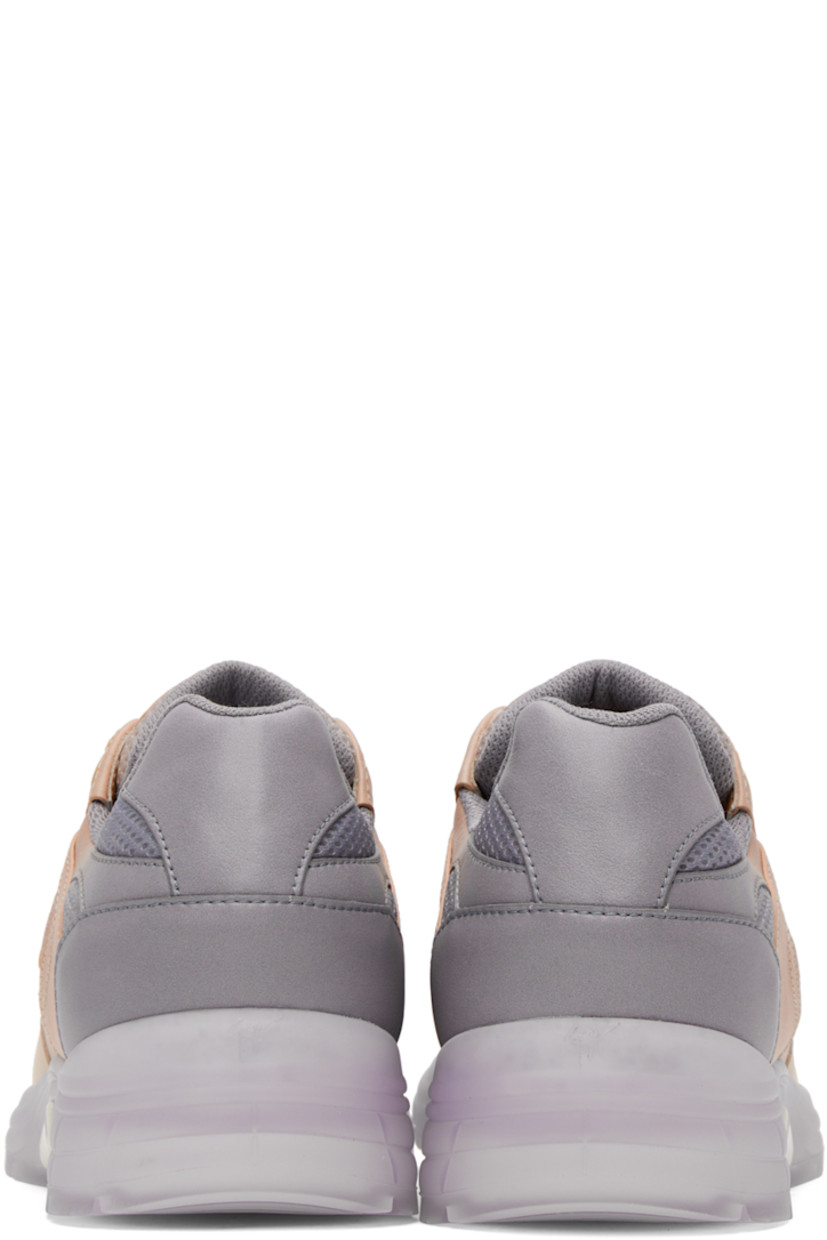 Low-top buffed faux-leather and mesh sneakers in tones of beige.

· Lace-up closure
· Logo patch at padded tongue
· Padded collar
· Rubberized logo at outer side
· Mesh lining
· Treaded translucent TPU rubber sole

Supplier color: Multibeige
