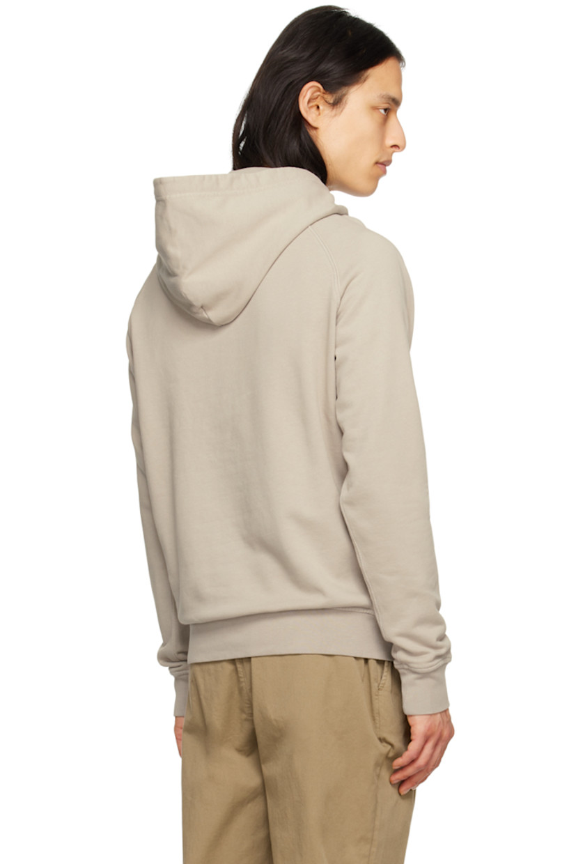 French terry hoodie.

· Drawstring at hood
· Kangaroo pocket
· Logo flag at hem
· Rib knit hem and cuffs
· Raglan sleeves

Supplier color: Beige