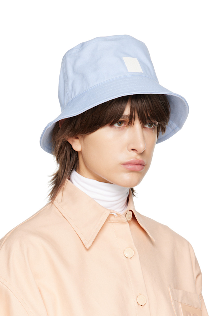 Basket-woven cotton bucket hat in blue.

· Logo-embossed leather patch at face
· Quilted brim
· Grosgrain browband
· Unlined

Supplier color: Light blue