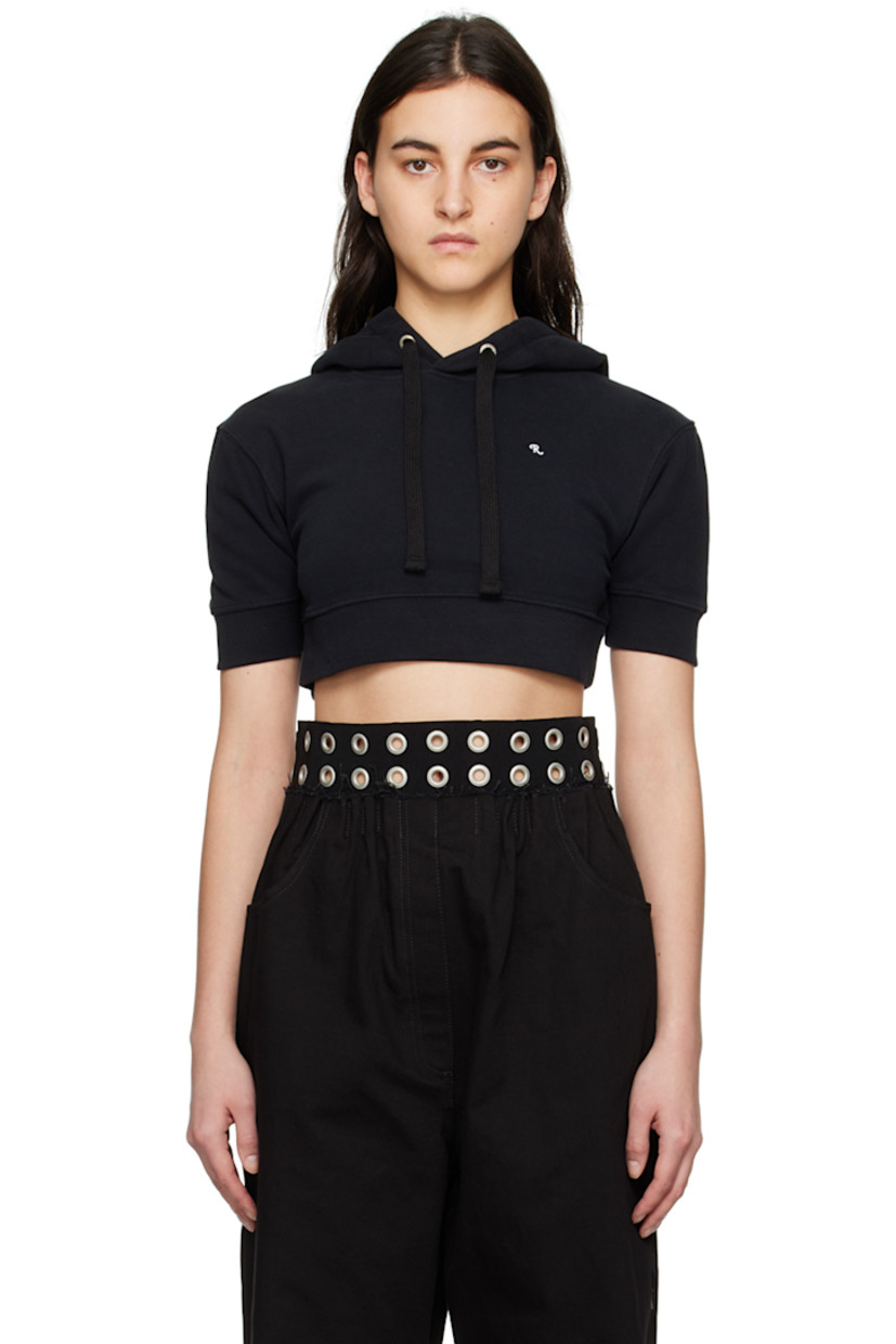 Cotton fleece hoodie. 

· Drawstring at hood
· Logo embroidered at chest 
· Rib knit cropped hem and cuffs 
· Leather logo patch at back hem

Supplier color: Black