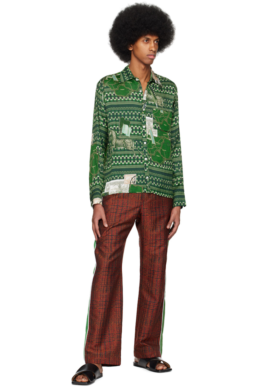 Viscose satin shirt. Graphic pattern printed throughout.

· Spread collar
· Button closure
· Concealed patch pocket at chest
· Single-button barrel cuffs

Supplier color: Green