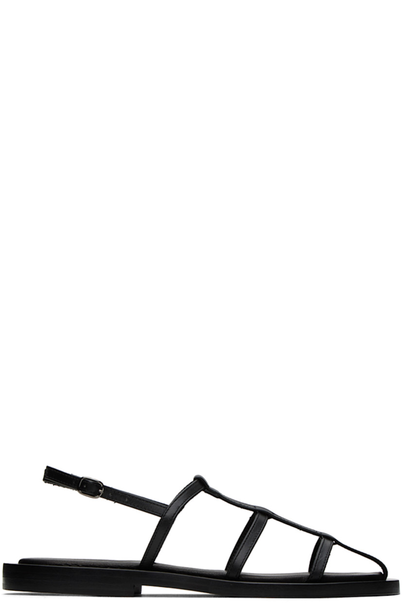 LWG-certified buffed leather flat sandals in black.

· Pin-buckle ankle strap
· Logo embossed at grained leather footbed
· Stacked leather midsole
· Leather sole with rubber injection

Supplier color: Black