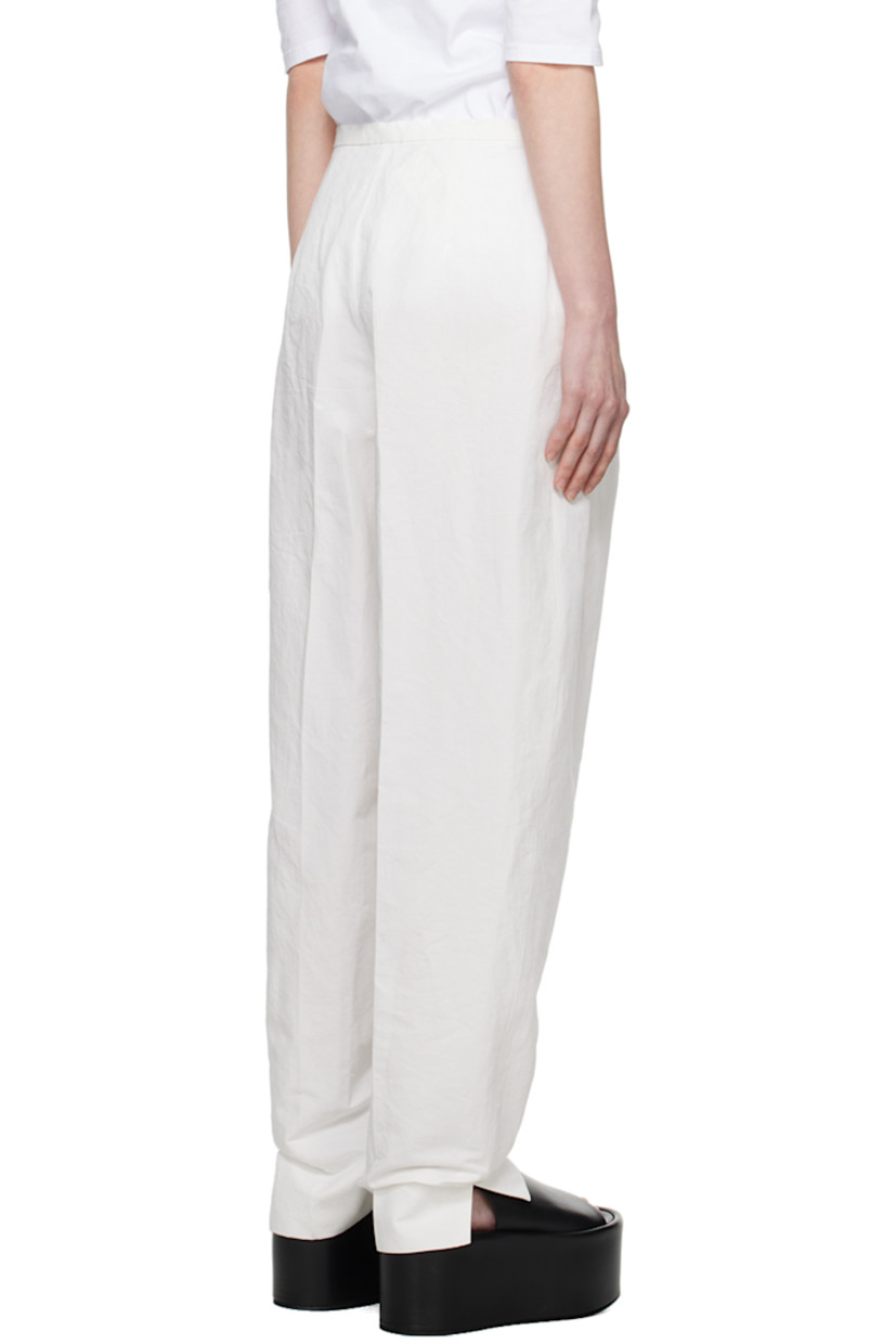 Cotton- and linen-blend twill trousers. 

· Two-pocket styling
· Zip-fly
· Pleats at front

Supplier color: White