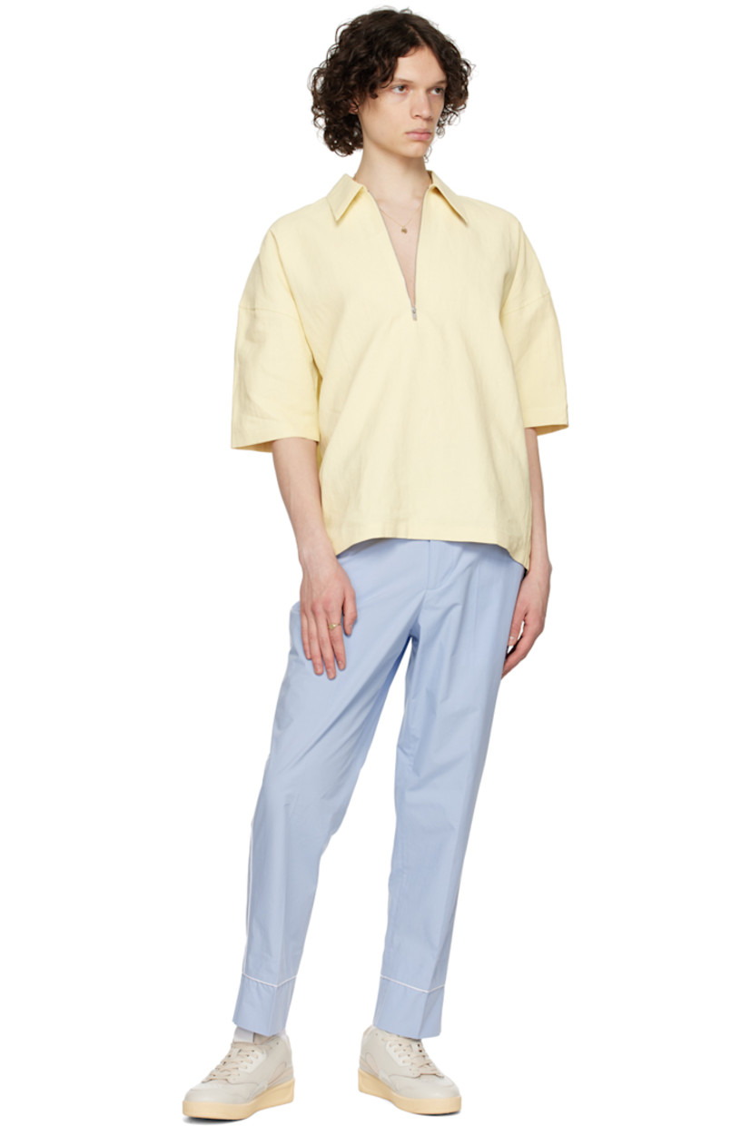 Straight-leg cotton poplin trousers. Piping throughout.

· Detachable cinch belt and belt loops
· Four-pocket styling
· Zip-fly
· Creases at front and back
· Cropped legs

Supplier color: Baby blue/white