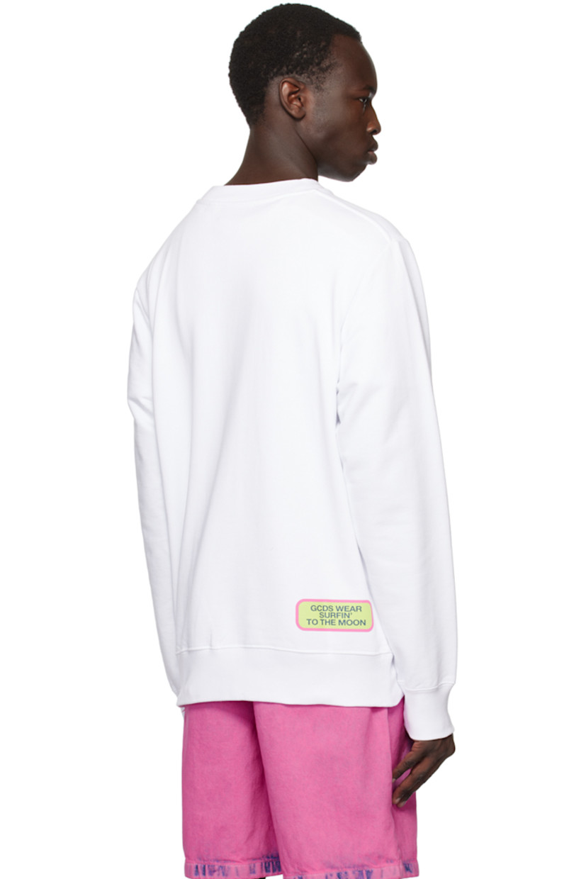 French terry sweatshirt. 

· Rib knit crewneck, hem, and cuffs
· Logo graphic appliqués at front
· Logo and text printed at back hem

Supplier color: White