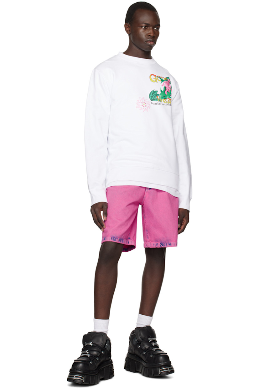 French terry sweatshirt. 

· Rib knit crewneck, hem, and cuffs
· Logo graphic appliqués at front
· Logo and text printed at back hem

Supplier color: White