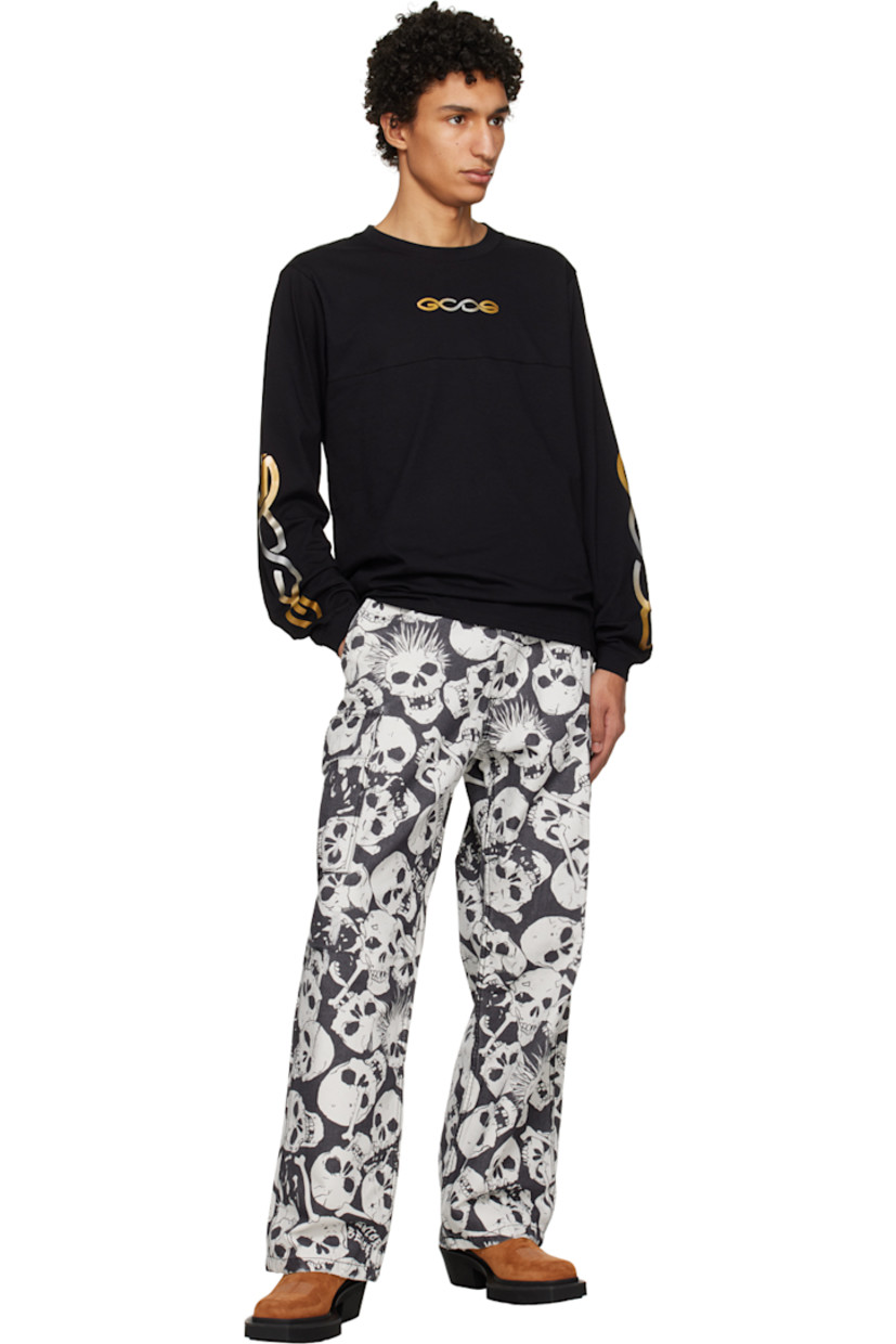 Cotton jersey T-shirt. 

· Rib knit crewneck and cuffs 
· Reflective logo printed at chest and sleeves 
· Logo graphic bonded at back collar 

Supplier color: Black