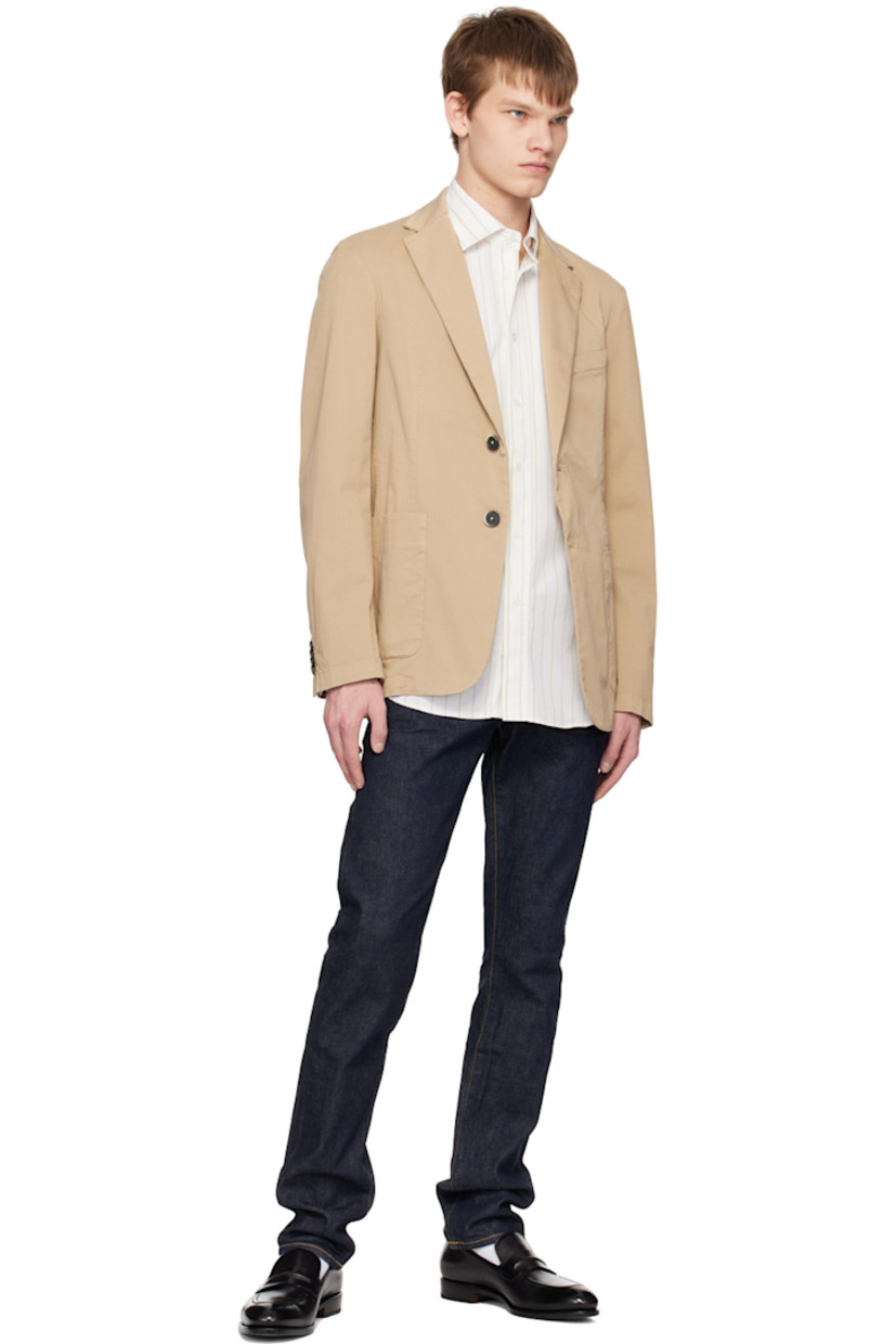 Cotton poplin shirt. Stripes throughout. 

· Spread collar
· Button closure
· Shirttail hem
· Single-button barrel cuffs
· Mother-of-pearl hardware

Supplier color: Off-white