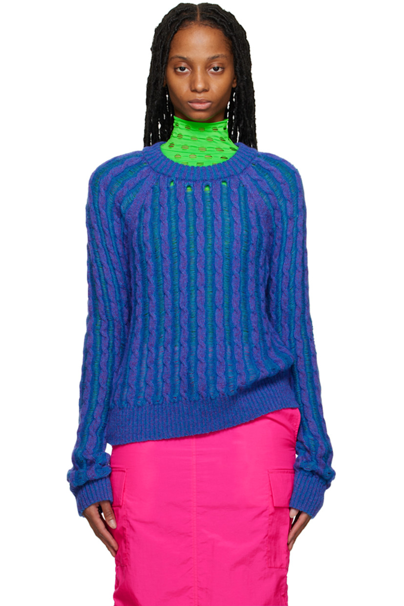 Semi-sheer cable knit mohair-blend sweater. Laddering throughout.

· Rib knit crewneck, hem, and cuffs
· Raglan sleeves

Supplier color: Navy