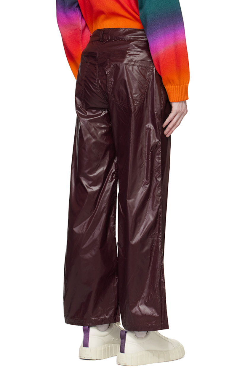 Nylon taffeta trousers.

· Belt loops
· Five-pocket styling
· Zip-fly
· Unlined

Supplier color: Purple