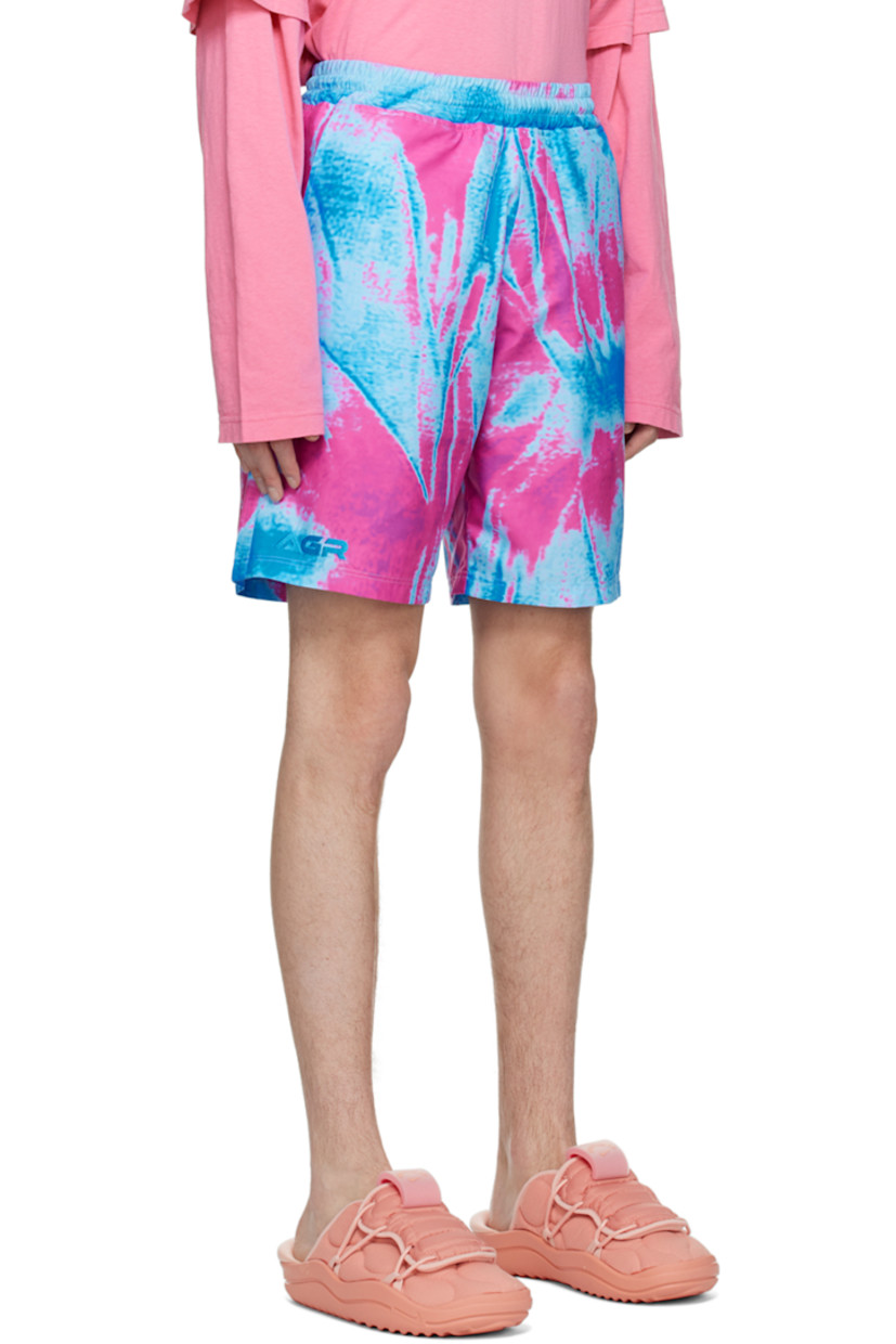 Nylon poplin swim shorts. Pattern printed throughout.

· Concealed drawstring at elasticized waistband
· Three-pocket styling
· Partial nylon mesh lining

Supplier color: Pink/Blue