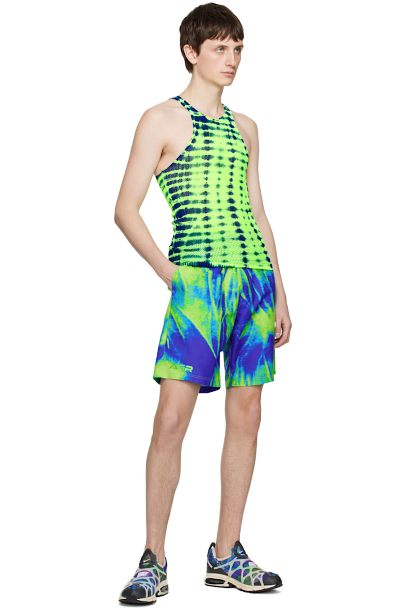 Knit stretch nylon tank top. Bleached effect throughout.

· Rolled scoop neck
· Rib knit hem

Supplier color: Blue/Yellow