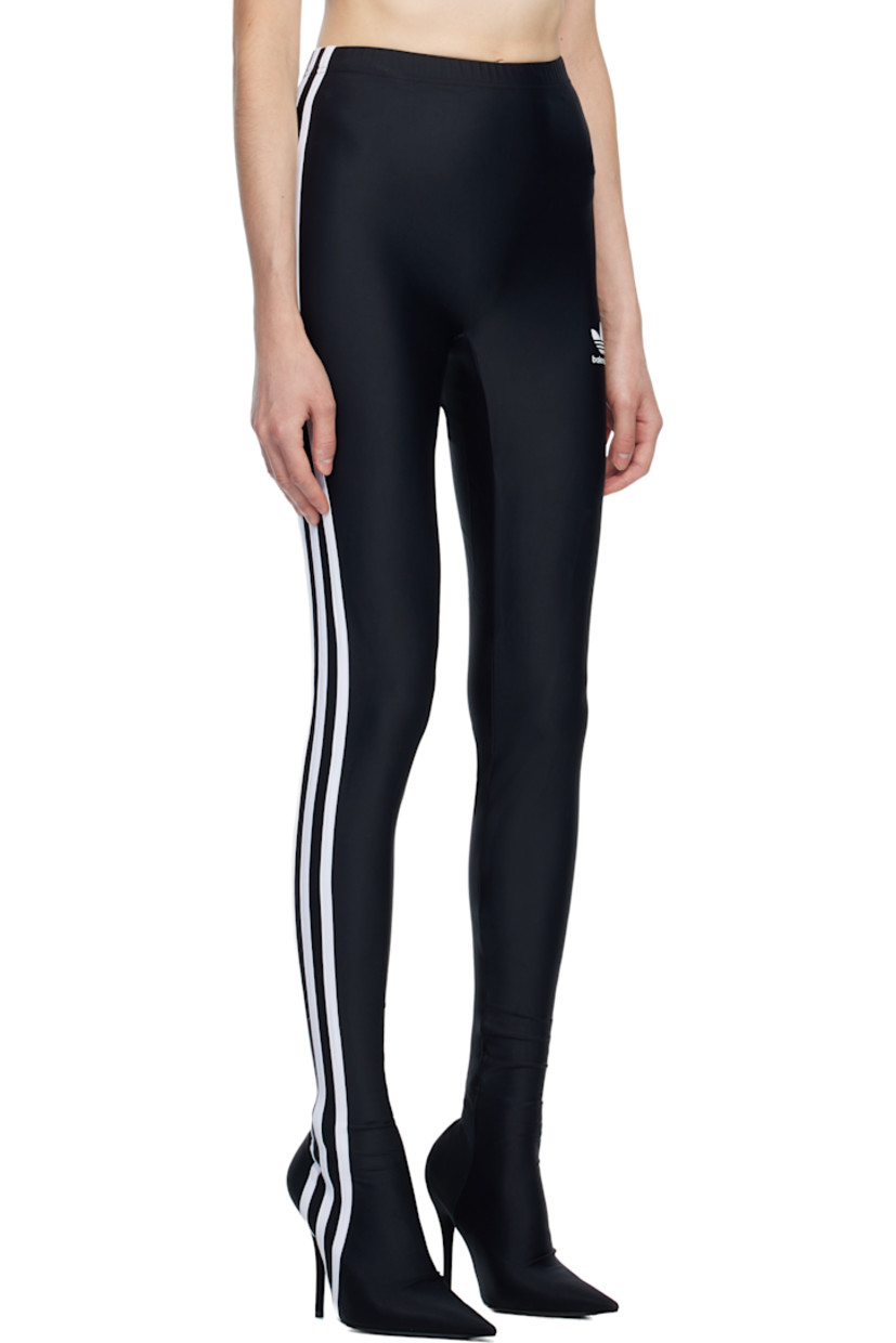 Stretch nylon jersey leggings. Integrated pointed-toe heels at hem.

· Elasticized waistband
· Stripe appliqués at outseams
· Jersey-covered stiletto heel
· Smooth rubber sole
· Heel: H4.25"

Part of the Balenciaga x adidas Originals collaboration.

Supplier color: Black