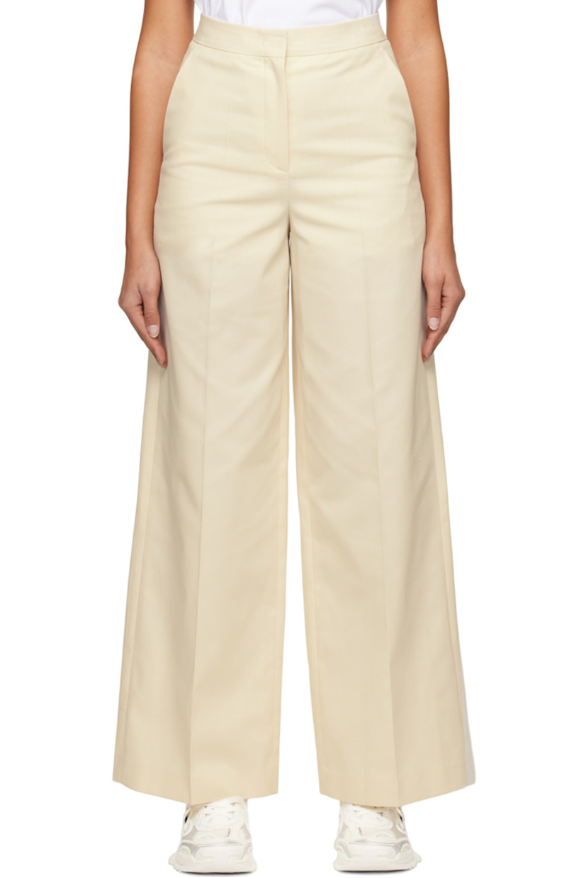 Polyester- and cotton-blend twill trousers.

· Four-pocket styling
· Zip-fly
· Creased legs

Supplier color: Ivory