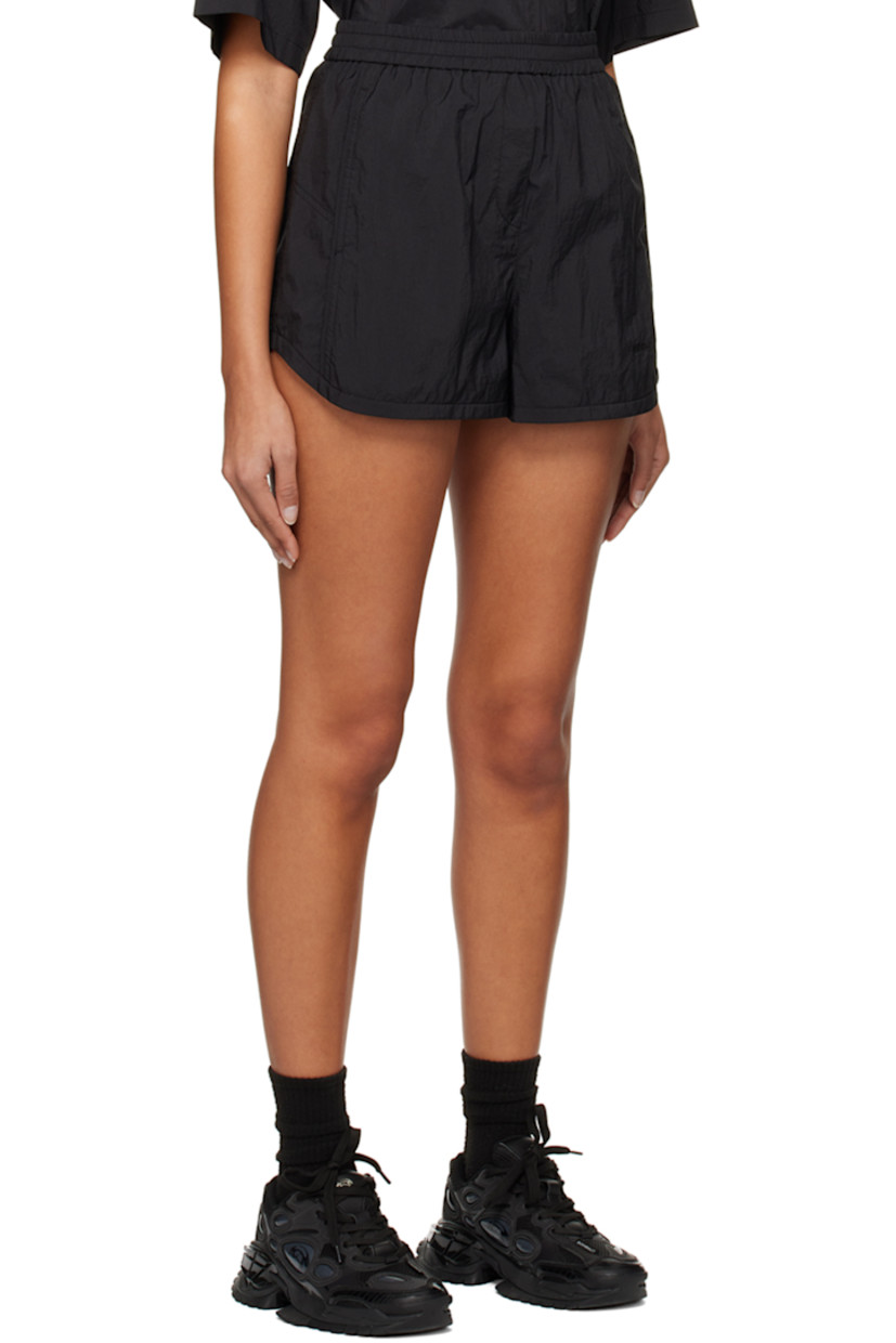 Nylon ripstop shorts.

· Concealed drawstring at elasticized waistband
· Two-pocket styling 
· Mock-fly
· Logo embroidered at cuff 
· Full mesh lining 

Supplier color: Black