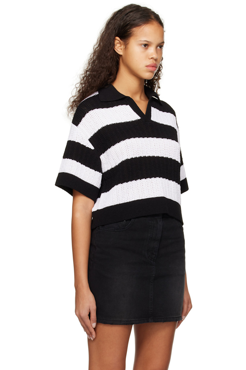 Knit acrylic-blend polo. Jacquard stripe pattern throughout.

· Rib knit spread collar , hem, and cuffs
· Open placket
· Dropped shoulders

Supplier color: Black