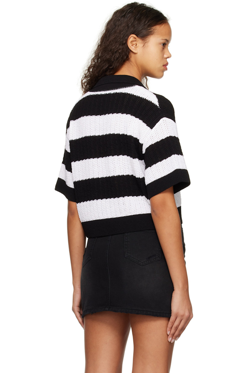 Knit acrylic-blend polo. Jacquard stripe pattern throughout.

· Rib knit spread collar , hem, and cuffs
· Open placket
· Dropped shoulders

Supplier color: Black