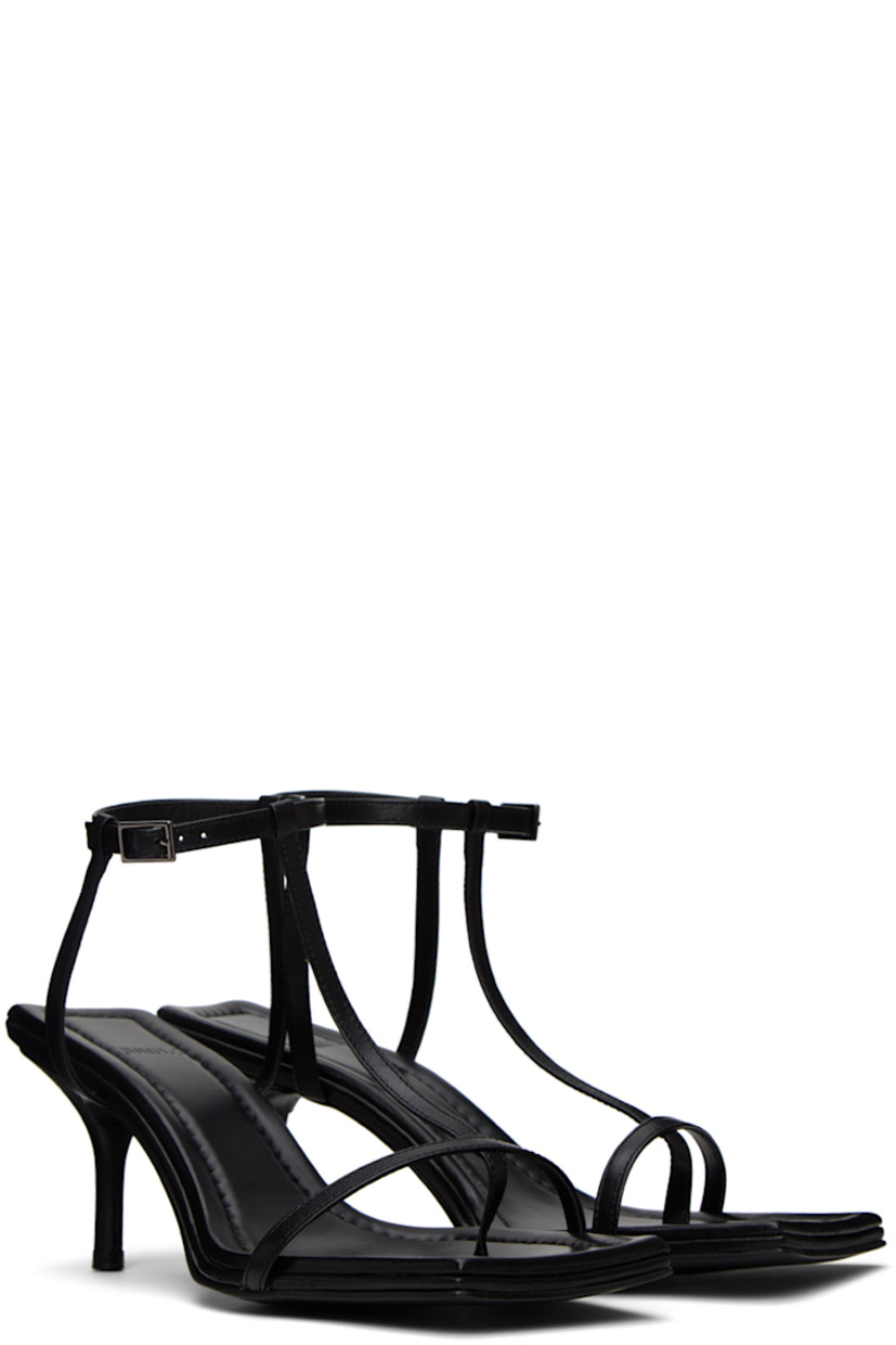 Grained leather heeled sandals in black.

· Open square toe
· Thong-style strap at vamp
· Pin-buckle ankle strap
· Logo embossed at padded footbed
· Covered kitten heel with rubber injection
· Leather sole
· Heel: H2.5 in

Supplier color: Black