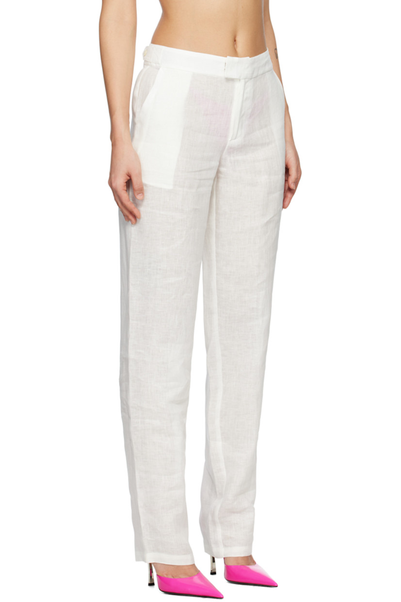 Wide-leg plain-woven cotton trousers. 

· Two-pocket styling 
· Zip-fly 
· Adjustable button tabs at back waistband 

Supplier color: White