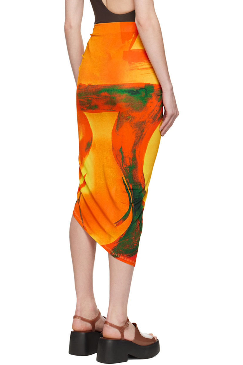 Stretch viscose jersey skirt. Pattern printed throughout.  

· Wrap construction
· O-ring and cutout at side seam
· Asymmetric hem
· Unlined

Supplier color: Checkmate