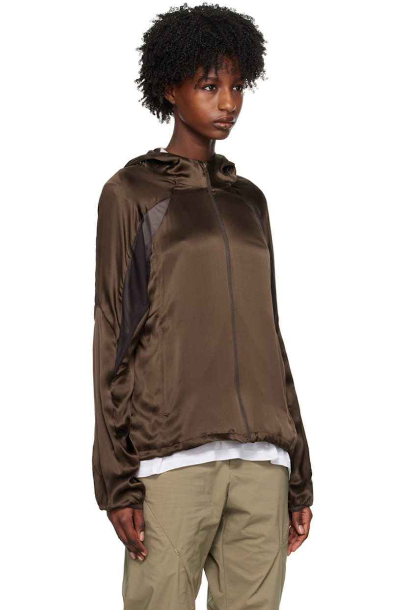 Paneled silk satin and polyester mesh jacket.

· Stand collar
· Zip closure
· Zip pockets
· Concealed bungee-style drawstring at hem
· Raglan sleeves
· Elasticized cuffs

Supplier color: Brown