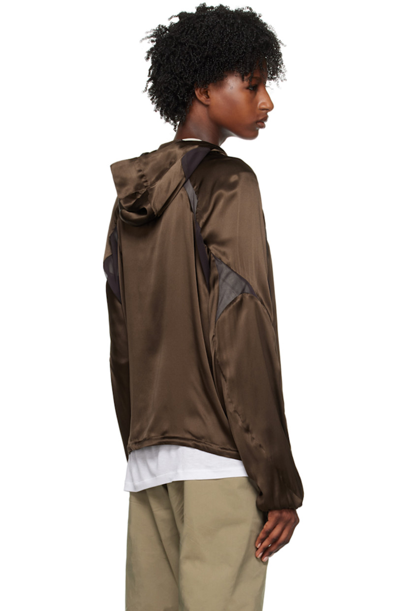 Paneled silk satin and polyester mesh jacket.

· Stand collar
· Zip closure
· Zip pockets
· Concealed bungee-style drawstring at hem
· Raglan sleeves
· Elasticized cuffs

Supplier color: Brown
