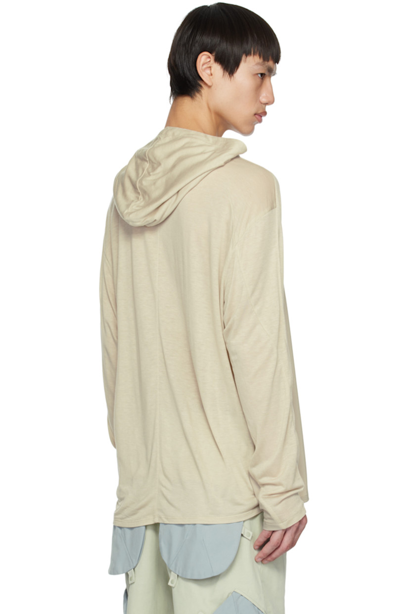 Crinkled nylon taffeta jacket. Water-resistant, lightweight, and packable.

· Zip closure extends from hood to back
· Bungee-style drawstring at hood
· Zip closure
· Zip pockets
· Concealed bungee-style drawstring at hem
· Thumbhole at elasticized cuffs
· Unlined

Supplier color: Gray green