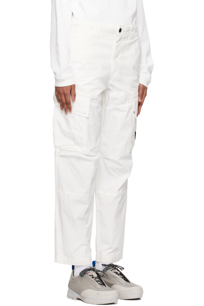 Relaxed-fit garment-dyed plain-woven cotton cargo pants.

· Belt loops
· Concealed drawstring at waistband
· Four-pocket styling
· Zip-fly
· Tucks at knees
· Acetate lens at outseam
· Cargo pocket at outseams
· Logo patch at back waistband 

Supplier color: Gauze white