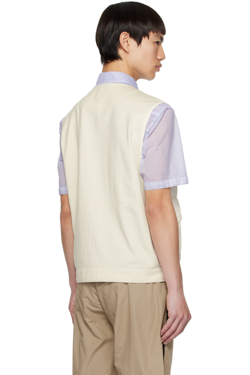 Garment-dyed heavyweight cotton jersey vest.

· V-neck
· Zip closure
· Flap pockets
· Acetate lens at side seam
· Unlined

Supplier color: Gauze white