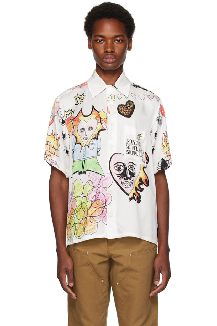 Viscose twill shirt. Graphics printed throughout.

· Spread collar
· Button closure
· Patch pocket
· Logo flag at side seam

Supplier color: White