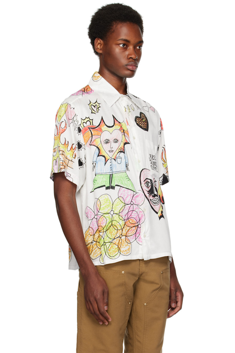 Viscose twill shirt. Graphics printed throughout.

· Spread collar
· Button closure
· Patch pocket
· Logo flag at side seam

Supplier color: White
