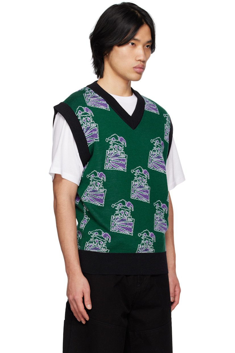 Knit wool and acrylic-blend vest. Jacquard graphic pattern throughout.

· Rib knit V-neck, hem, and armscyes
· Logo flag at side seam 

Supplier color: Green