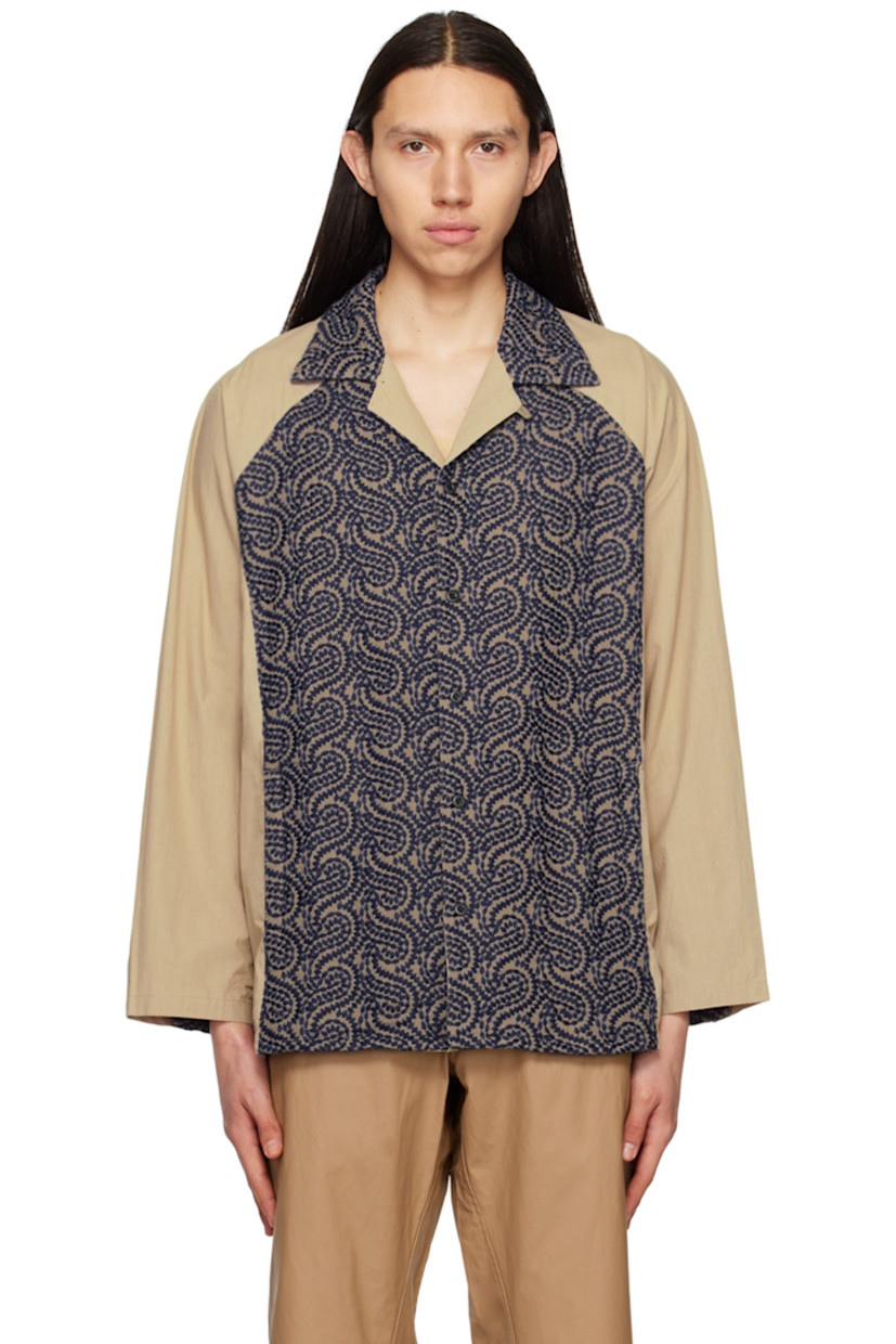Cotton poplin shirt. Graphic pattern embroidered throughout. 

· Paneled construction 
· Open spread collar 
· Button closure 
· Welt pockets
· Tennis-tail hem 
· Single-button barrel cuffs 

Supplier color: Beige/Navy