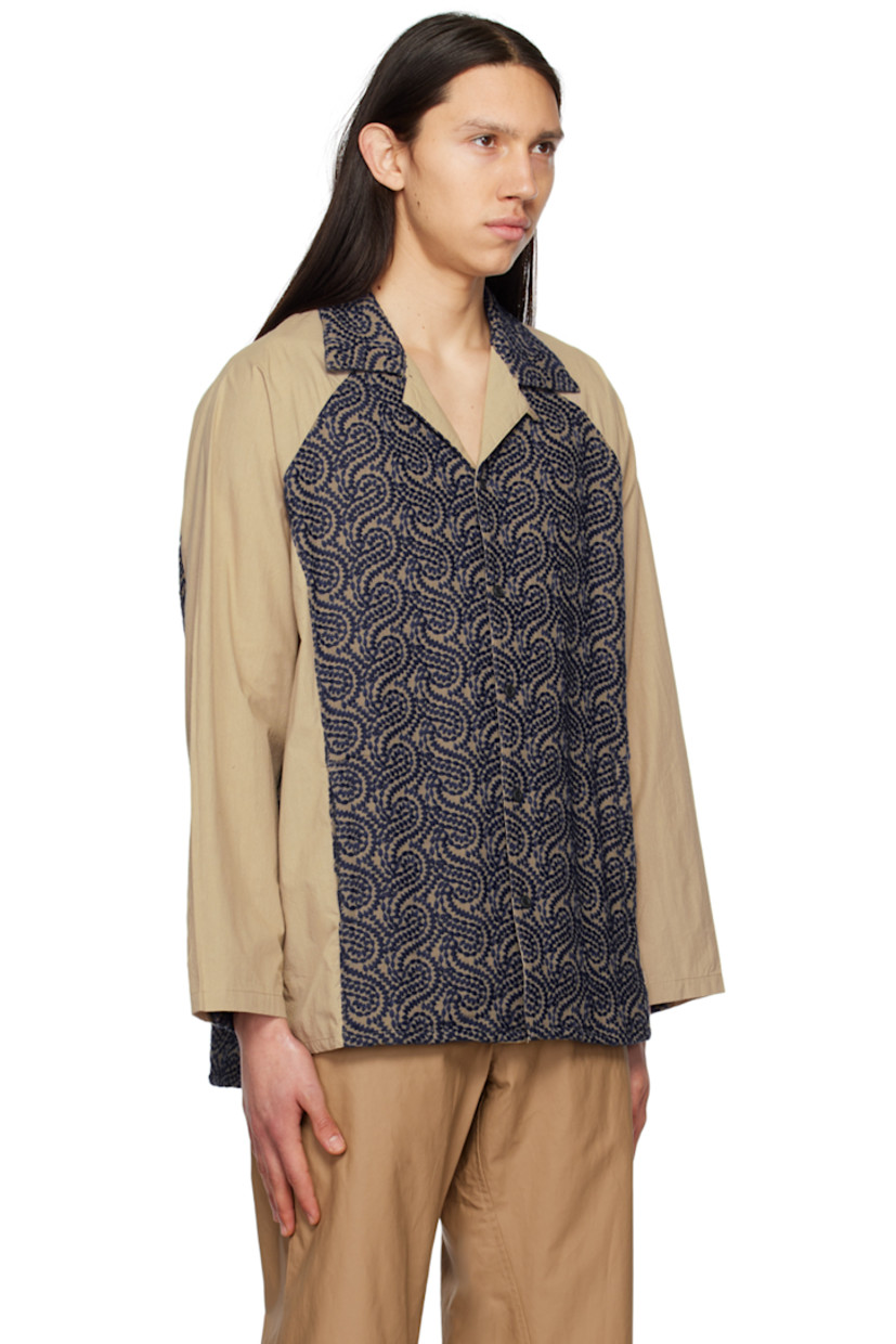 Cotton poplin shirt. Graphic pattern embroidered throughout. 

· Paneled construction 
· Open spread collar 
· Button closure 
· Welt pockets
· Tennis-tail hem 
· Single-button barrel cuffs 

Supplier color: Beige/Navy