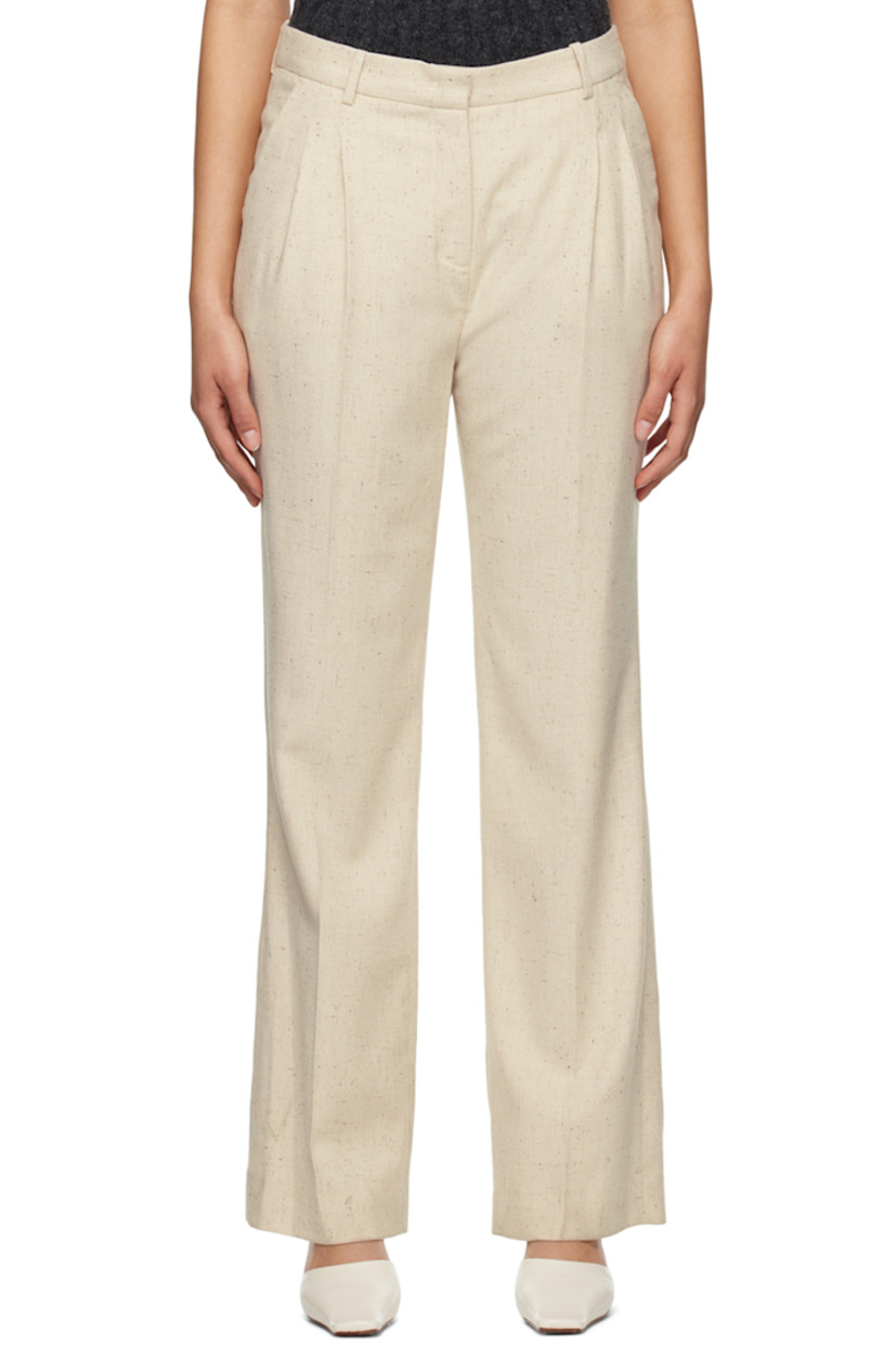 Straight-leg stretch viscose and wool-blend twill trousers.

· Belt loops
· Three-pocket styling
· Zip-fly
· Pleats at front waistband
· Central crease at front and back legs
· Partial plain-woven lining 

Supplier color: Linen