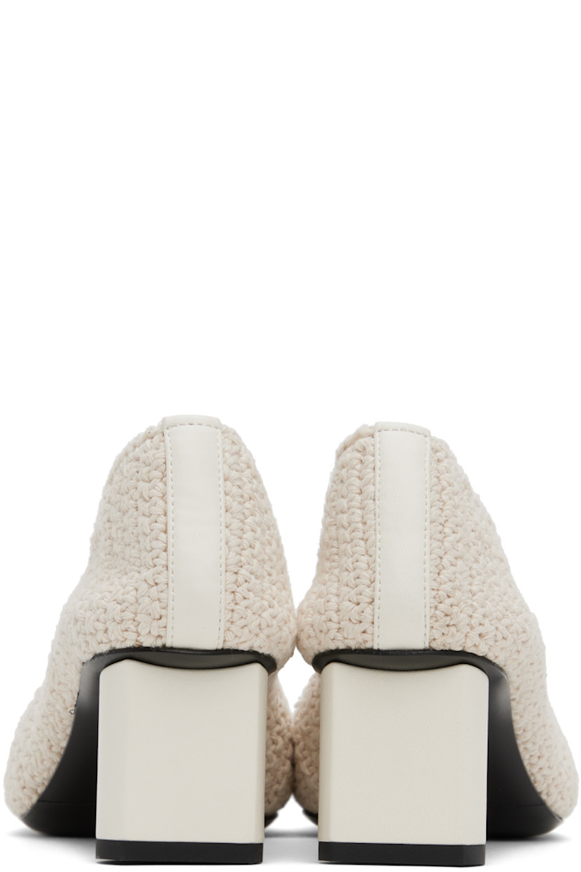 Crocheted cotton heels in off-white. 

· Partial buffed leather lining
· Covered block heel with rubber injection
· Leather sole
· Heel: H2 in

Supplier color: Ivory