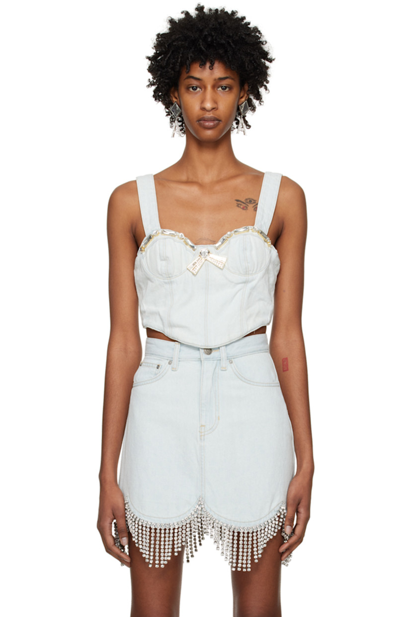 Non-stretch cotton- and recycled cotton-blend denim camisole. Fading throughout. 

· Sweetheart neck 
· Crystal-cut detailing and bow accents at front 
· Adjustable shoulder straps 
· Zip closure at back 
· Full cotton twill lining 
· Logo-engraved antiqued gold-tone hardware 
· Contrast stitching in gold 

Supplier color: Pale blue