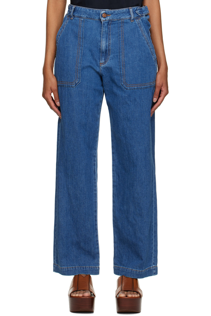 Stretch cotton-and linen-blend denim jeans. Fading throughout.

· Belt loops
· Cinch straps at waistband
· Four-pocket styling
· Zip-fly
· Logo-engraved antiqued brass-tone hardware
· Contrast stitching in tan

Supplier color: Truly navy